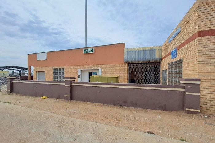 Kwazakhele Office For Sale: 214 m2, prime location, rental income potential.