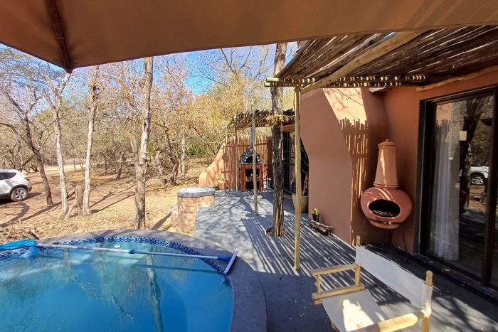 Marloth Park Central House For Sale: 1 bed, pool, spacious lot, nature retreat.