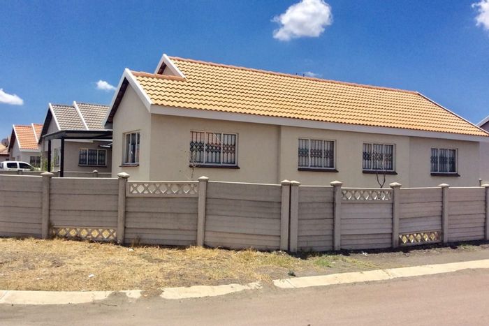 House For Sale in Freedom Park: 4 bedrooms, en-suite, covered parking, spacious lot.