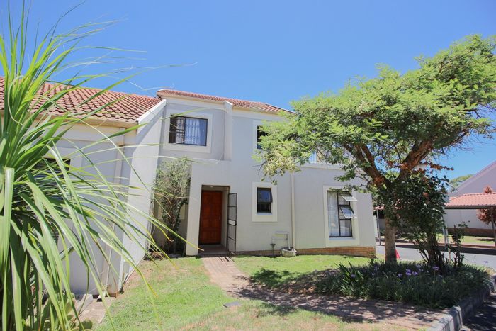 For Sale: Townhouse in Broadacres with large yard, clubhouse, and pool access.