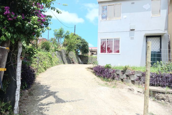 2-Bedroom Townhouse For Sale in Stonebridge with ample yard and parking space.