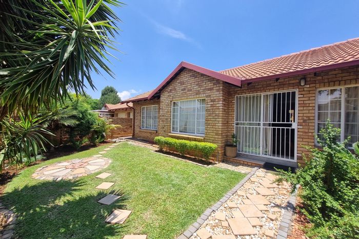 For Sale: Townhouse in Equestria with 3 beds, double garage, pool access.