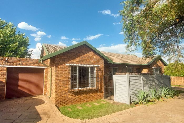 Highveld Townhouse For Sale: 2 beds, garden, double garage, pool, and security.