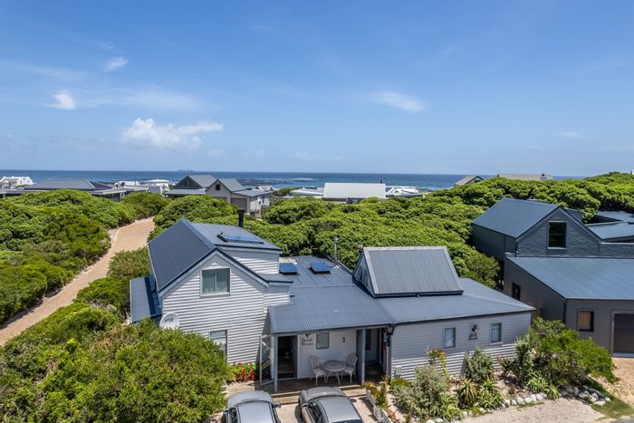 Klein Slangkop House For Sale: Open-plan living, private beach access, Airbnb potential.