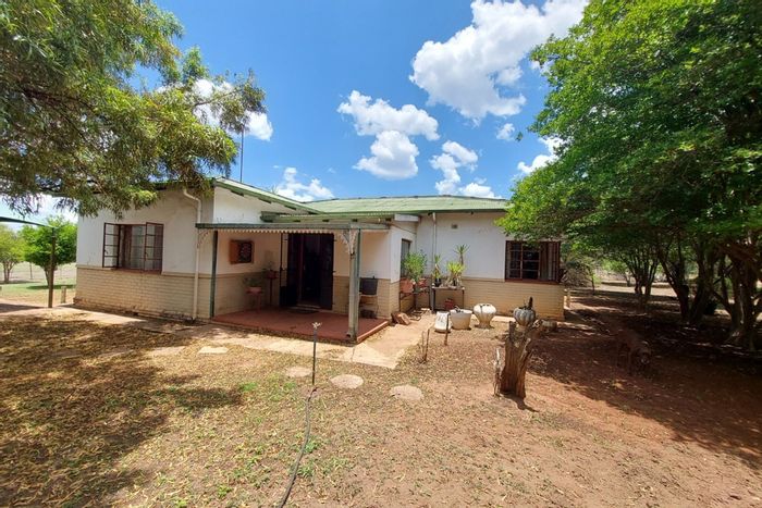 3-Bedroom House For Sale in Modimolle Central with agricultural potential and storage.