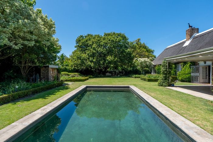 Historic Alphen house for sale: pool, guest cottage, borehole, landscaped garden.