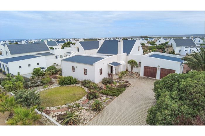 House for Sale in Jacobsbaai: Open-plan living, covered patio, established garden, double garage.