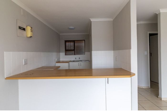 2-Bedroom Apartment To Rent in Morgenster with balcony, pre-paid utilities, and parking.