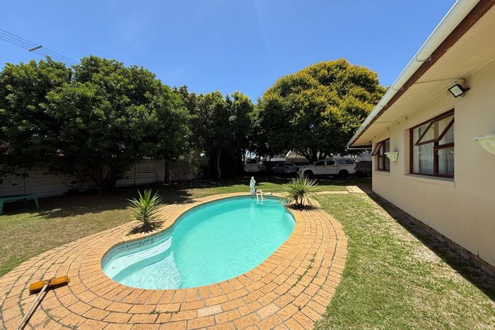 Furnished apartment in Table View with pool, braai area, and secure parking. To Rent.