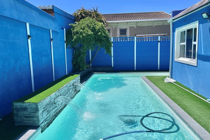 Spacious Strandfontein house for sale with garden, garage, and sea views.