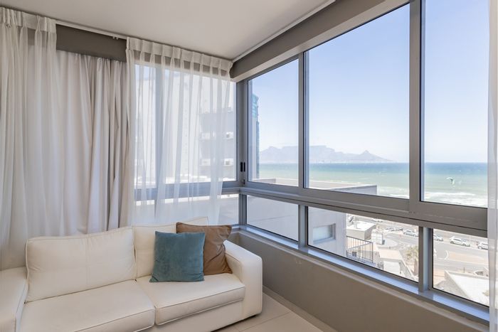 Bloubergstrand Apartment For Sale: Ocean views, pool access, and secure parking.