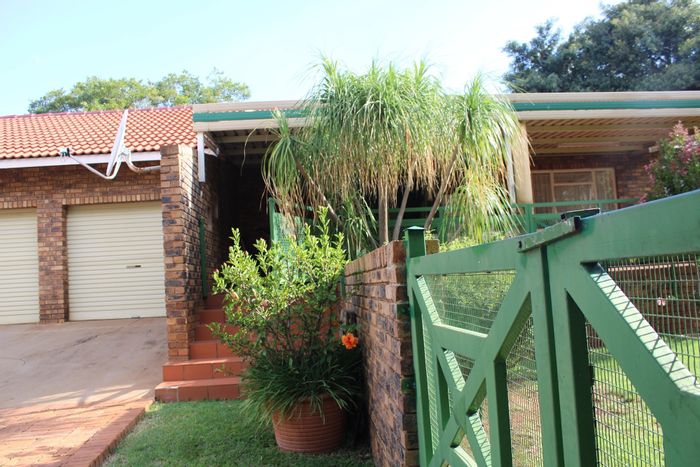 Ninapark House For Sale: 4 beds, 2 baths, double garage, spacious yard.
