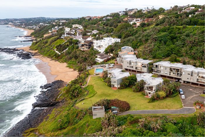 For Sale: Apartment in Sheffield Beach with sea views, patio, and double garage.