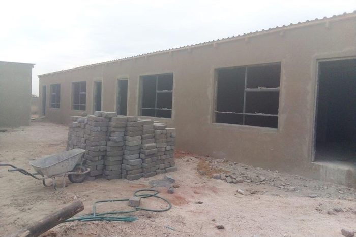 For Sale: House in Thubelihle, ideal for investors, under construction, sold as is.