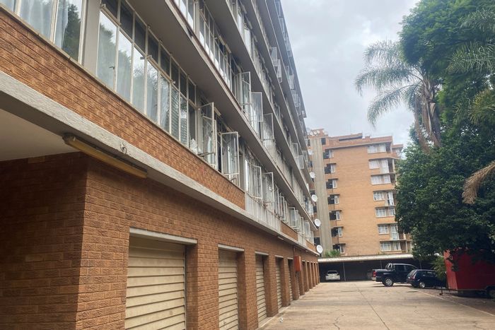 3-Bedroom Apartment in Sunnyside For Sale, Great Investment with Rental Income.