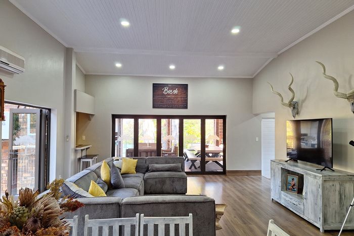 House for Sale in Kranspoort: Open-plan living, game reserve views, energy-efficient features.