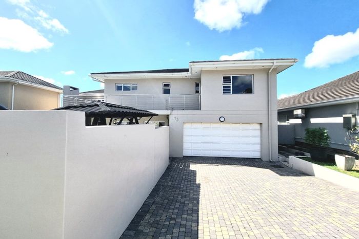 For Sale: 4-Bedroom House in Beacon Bay with pool, bar, and sports amenities.