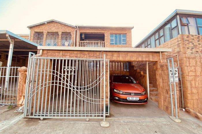 For Sale: Townhouse in Sunford with secure parking, private balcony, and guest convenience.