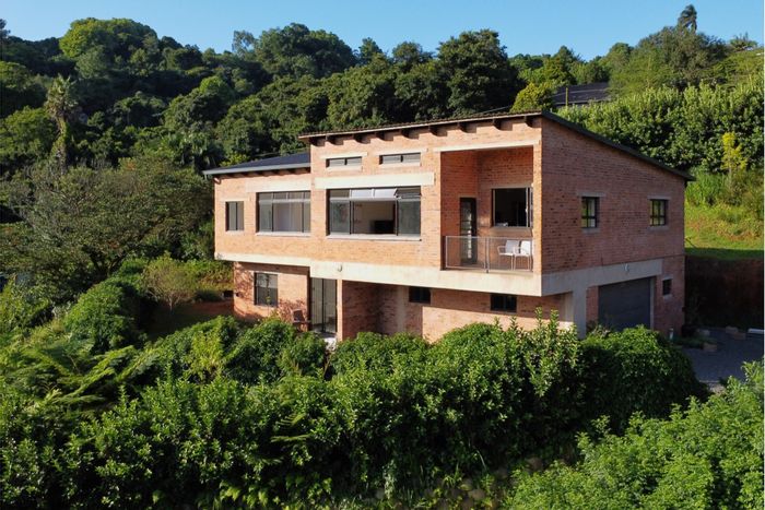 For Sale: House in Worlds View with 5 bedrooms, dual living areas, and scenic views.
