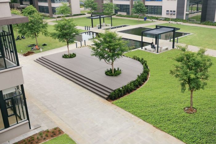 Office To Rent at Clearwater Estate: Air conditioning, restaurant, sports courts, lush gardens.
