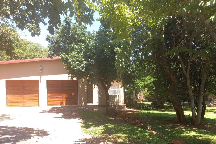 4-bedroom house for sale in Protea Park with pool, study, and spacious yard.