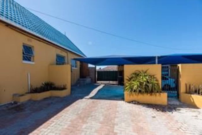 House For Sale in Strandfontein: 5 bedrooms, parking, borehole, approved pool plans.