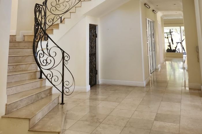For Sale: House in Sandhurst with pool, wine cellar, gym, and expansive garden.