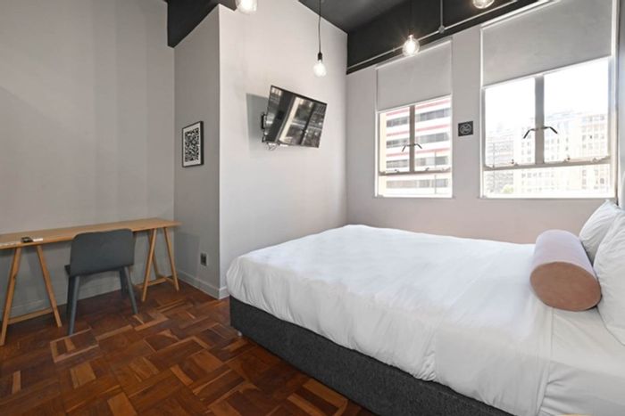 For Sale: Cape Town City Centre apartment with workspace, gym, and rooftop views.