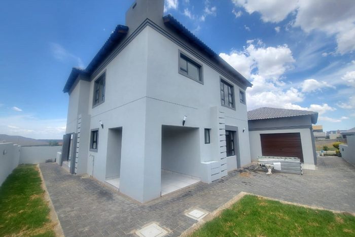 For Sale: Spacious 4-bedroom house with double garage in Woodhill Estate.