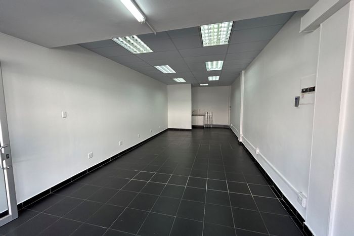 Retail space to rent in Newton Park with parking, kitchenette, and security.