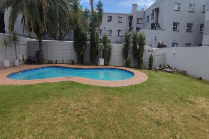 For Sale: Apartment in Zonnebloem with 2 bedrooms, parking, pool, and security access.