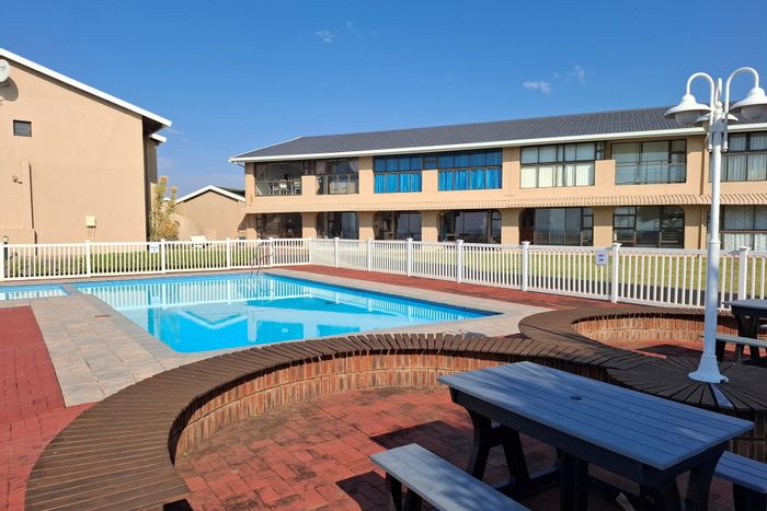 2-Bedroom Apartment For Sale in Shelly Beach with pool, gardens, and parking.