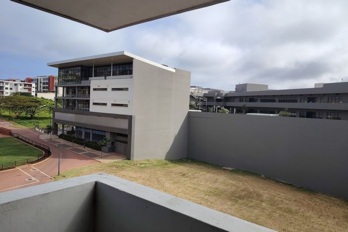 For Sale: Apartment in New Town Centre with 2 beds, parking, and security.