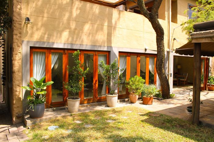 For Sale: Olivedale Townhouse with 4 bedrooms, garden, and 24-hour security.