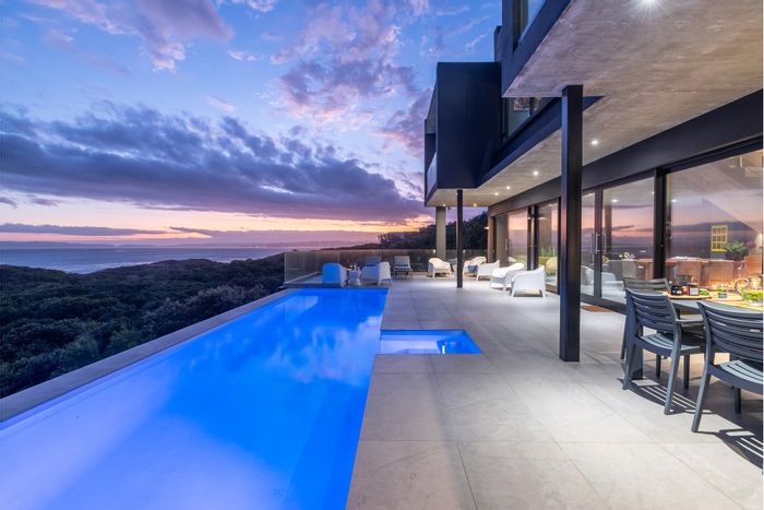 For Sale: Beachfront House in Keurboomstrand with pool, studio, and private access.