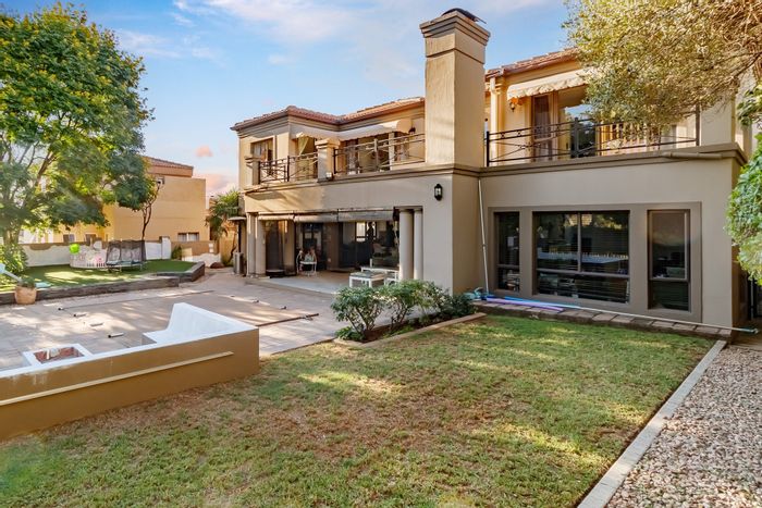 For Sale: House in Blue Valley Golf Estate with golf access, solar power, and spacious yard.