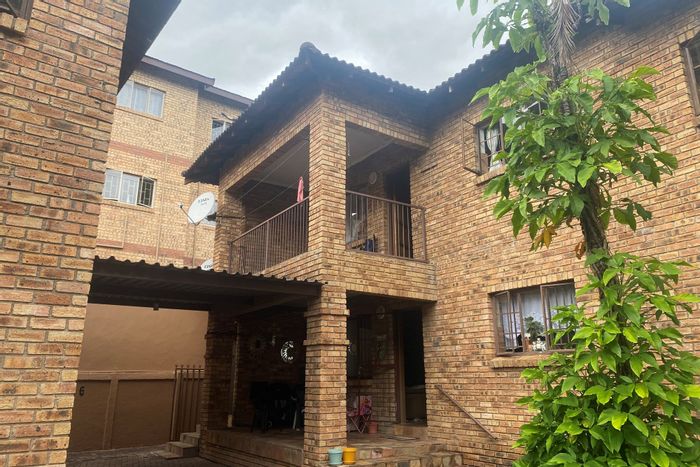 For Sale: 2-Bedroom Apartment in West Acres with Parking, Security, and Open Living Space.