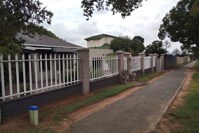Spacious house for sale on The Hill: 4 beds, 4 baths, dual kitchens.