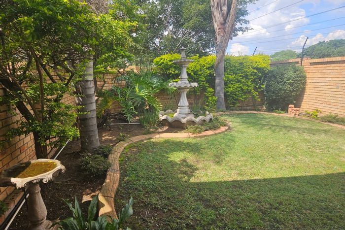 For Sale: Rooihuiskraal North Townhouse with 2 en-suites, garden, and garage.