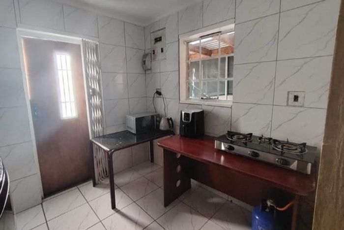 Lentegeur House For Sale: 3 bedrooms, updated kitchen, garage, and carport.