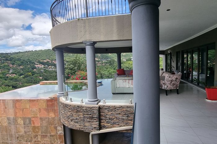 For Sale: Spacious Sonheuwel House with flats, cinema, pool, and panoramic views.