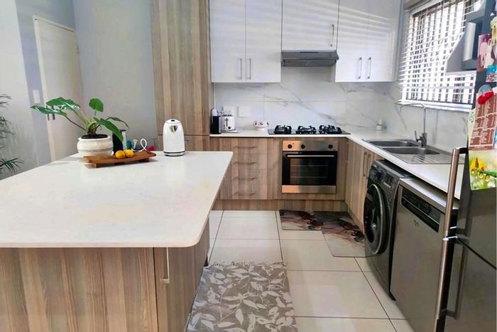For Sale: 3 Bed Townhouse in Paulshof with secure living, garden, and parking.