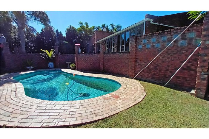 Spacious Nahoon Valley Park house with flatlets, pool, and entertainment area for sale.