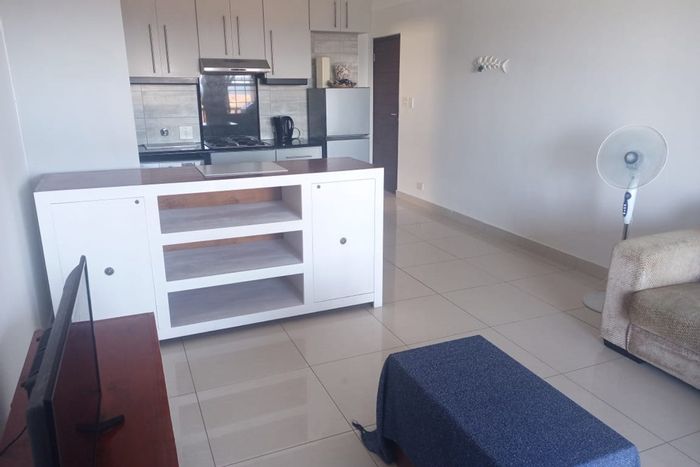 La Mercy Central Apartment To Rent: 1-bedroom, sea views, balcony, secure complex.