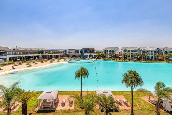 1-Bed Apartment For Sale at Blyde Riverwalk Estate with lagoon, gym, and security.