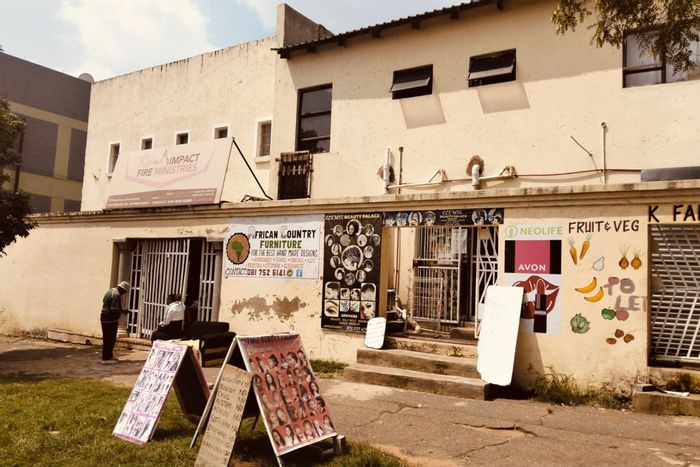 For Sale: Turffontein Apartment with shops, bachelor units, and income potential.