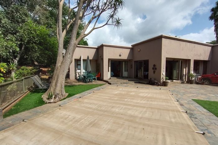 For Sale: House in Mount Amanzi with pool, braai room, and resort amenities.