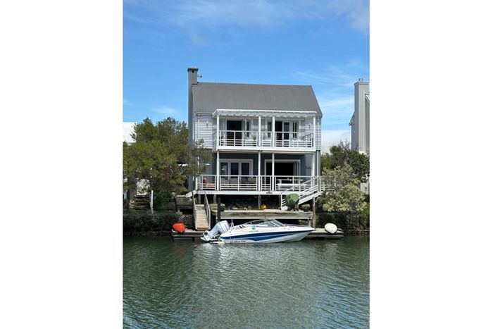 Canal House in Thesen Islands: 3 Beds, 3 Baths, Kayaks, and Mooring Available.