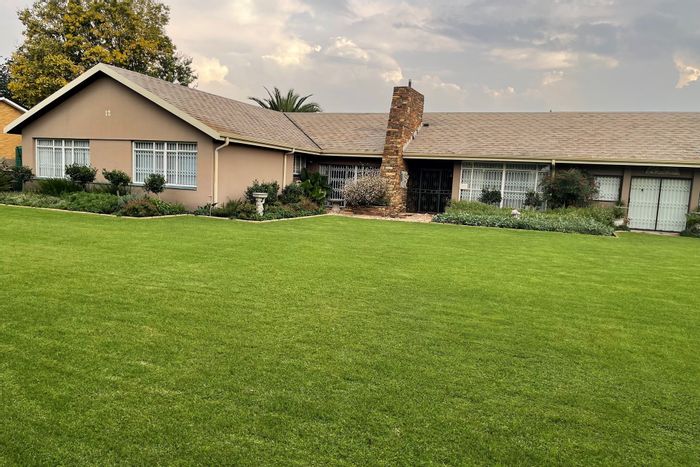 For Sale: Kinross House with two homes, pool, and extensive outdoor space.
