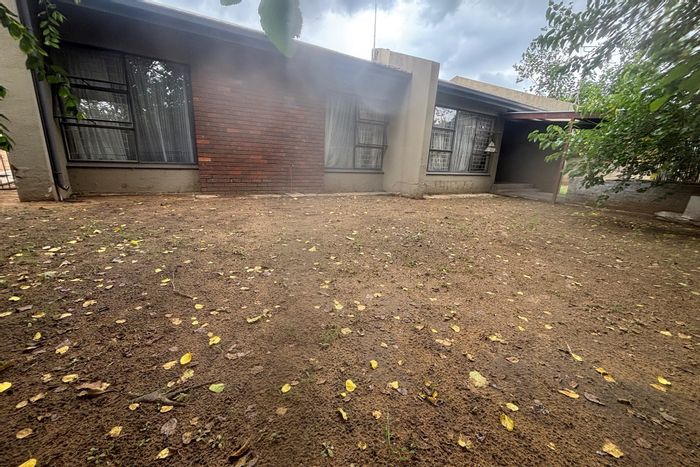 For Sale: Spacious 3-bedroom house in Sasolburg Ext 11 with garden and garage.